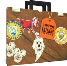 Load image into Gallery viewer, The briefcase slipcover for A Book to Make Friends With by Lukas Verstraete. The briefcase slipcover is brown with black handles and features the title on an orange tag drawn onto the cover. The slipcase also features various sticker-like drawings of faces and strange creatures.