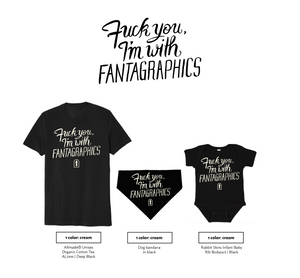 An image of the "Fuck You, I'm With Fantagraphics" design, written in a swirling and blocky font over the Fantagraphics nib logo. The text is printed on a black shirt, dog bandana, and baby onesie in cream ink. 