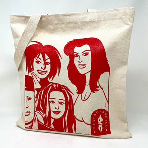 A photo of a canvas tote bag featuring characters from Love and Rockets in red ink.
